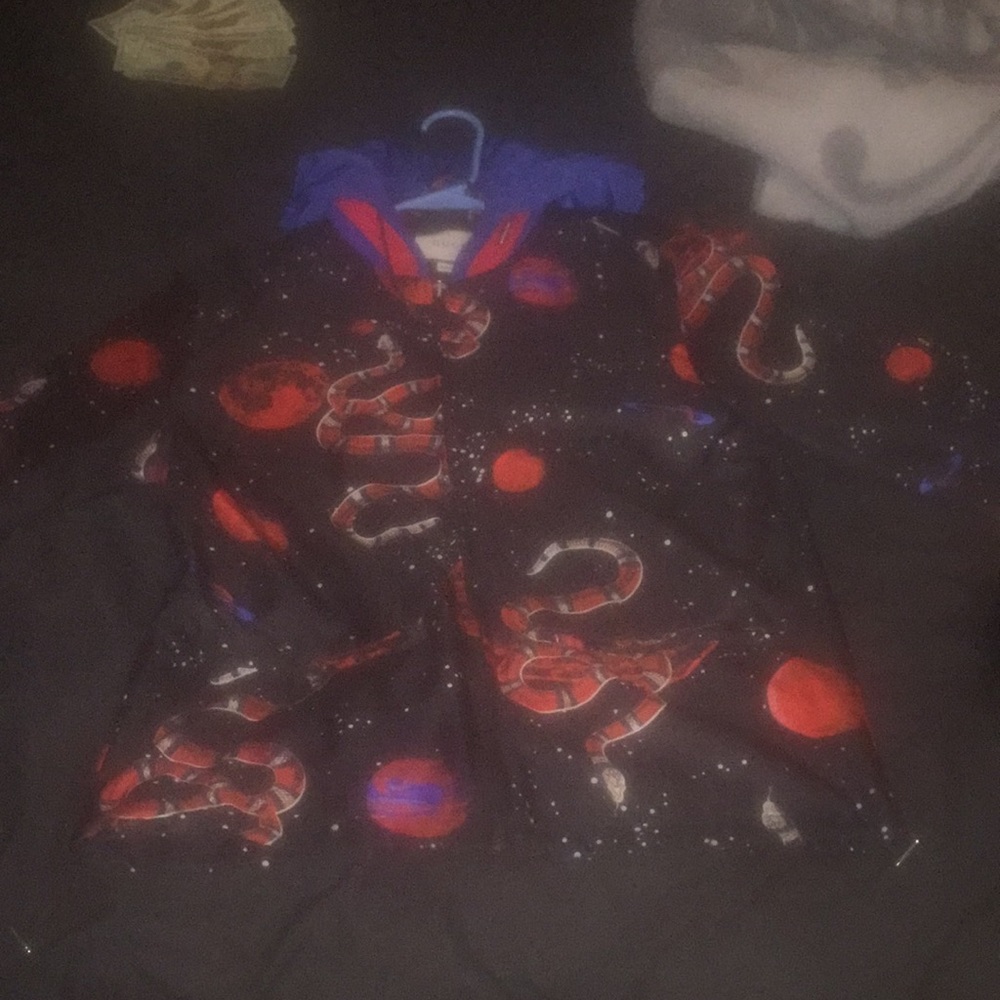 Gucci space snake print windbreaker.